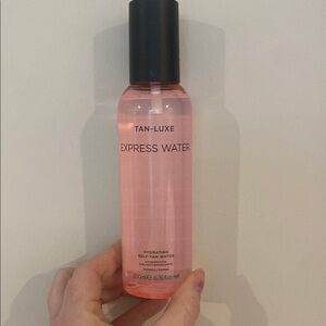 Pink and Black Suncare Essence with Hydrating Formula